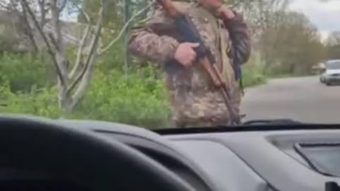 Ukrainian recruitment officers in Vinnitsa stoping cars and inviting volunteers to the front lines.