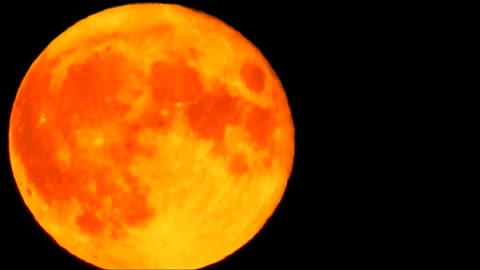 Jaw-dropping footage of bright orange moon