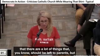 Democrat In Action - Criticizes the catholic church then wears a shirt that praises Satan - typical