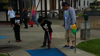 Family fun on the masters mini golf course