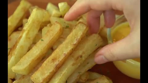 Fried Potatoes and Cheese Sauce :: How to Make Crispy French Fries