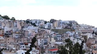 A look out over Athens Greece at sunset.