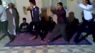 Men are dancing in a wedding party