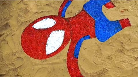 Making a Spider-Man in the sand