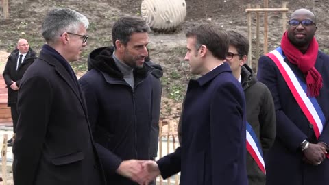 Macron attends inauguration of the Olympic village near Paris