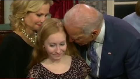 Joe Biden kissing girl