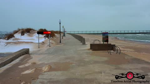 Ice Starting To Form on Pier & Lighthouse on Lake, Michigan Full Dec 24 2020