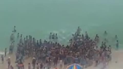 Baptism On Panama Beach Draws Cheering Crowd