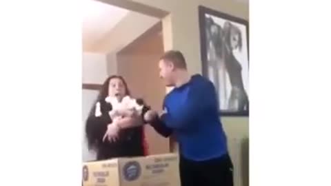 Guy Scares Lady Holding Cat