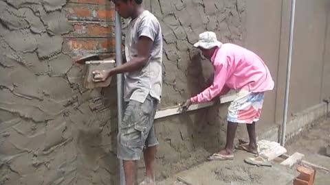 Sri Lanka,ශ්‍රී ලංකා,Ceylon,Plastering a Brick wall (Mortar)