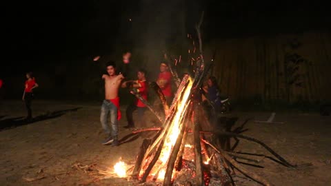 Wild dancing around magic fire at the camfire