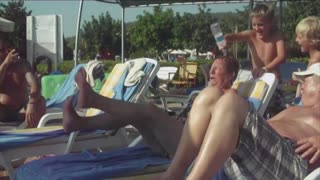 Poolside Prank Ends In Family Flash