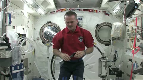 Astronaut Chris Hadfield demonstrates how to contain vomit in space. www.nasa.gov/education/tfs/dil