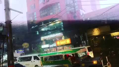 Heavyrain on the Jeepney roof at Philippine night.