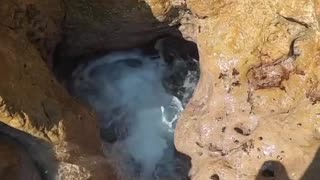 Hole in Rocks by the Sea Turns into Underwater Tunnel