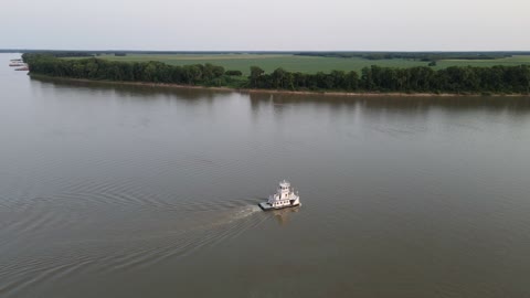 A Barge Making It's Way Down the Ohio River \ Gorgeous Evening Drone Video