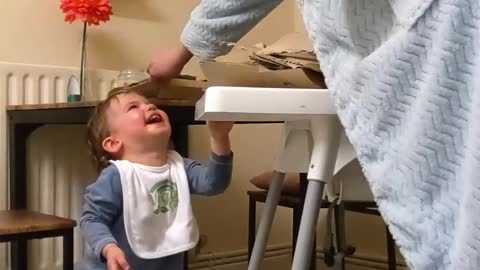 Baby Delighted By Recycling