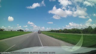 Driver Rear Ends Slow Moving Car