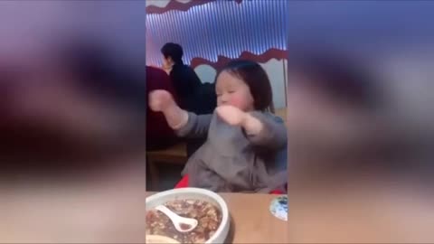 eating and dancing with the baby