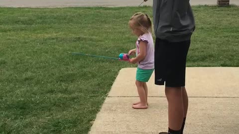 Lili gets first fishing pole for her birthday