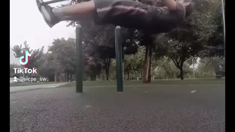 Front lever pullups with a resistance band