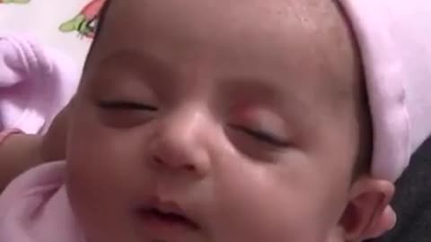 Cute baby' expression while sleeping... I think cutie is dreaming..