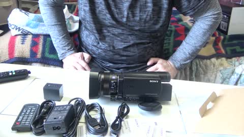 Open box Sony FDR AX100/B handy cam Camcorder