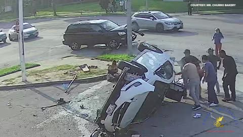 Footage from Milwaukee bakery captures the moment two pedestrians are hit by a rolling car