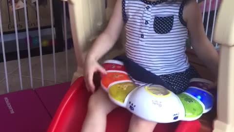 Musical toys can keep her occupied… for a minute