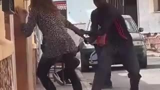 Black Migrant Attacking Spanish Lady While People Watch