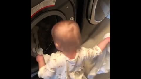 Toddler Really Likes Assisting Mommy With The Laundry