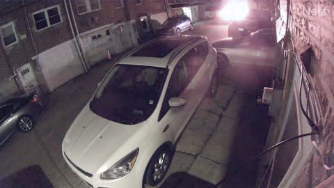 Speeding Car in Back Alley Smashes a Parked Car and Takes Off