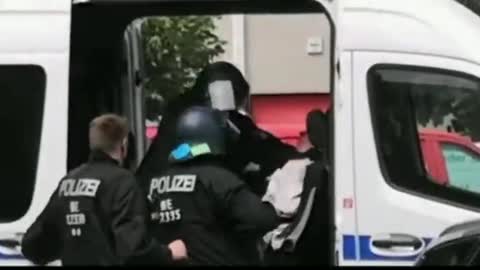 Gemany - Berlin. Police beat up and force man to wear mask