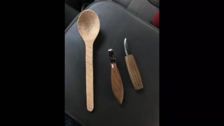 Hand carving a wooden ladle
