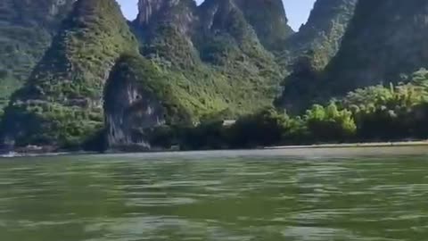 Mountains: Rivers: boats