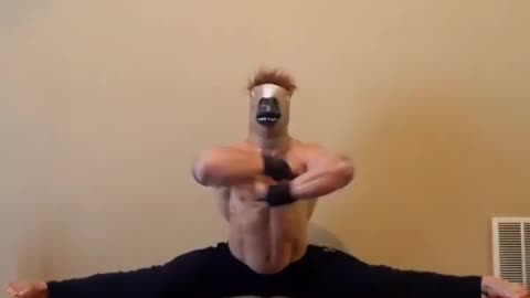 Bodybuilder with horse HEAD MASK HILARIOUSLY THROWS HIMSELF ON CHAIRS AFTER DOING SPLIT