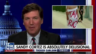 Tucker Carlson has a laugh over AOC referring to herself as “working-class”