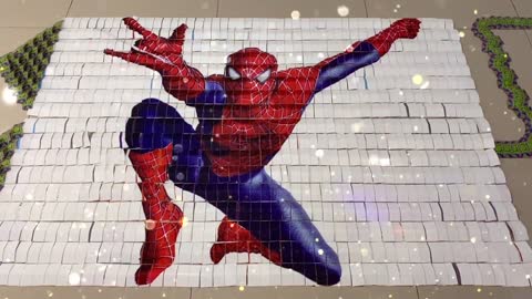 Use 20,000 dominoes to shape the image of Spider-Man.