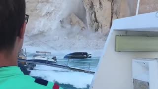 Cliff collapses on Greek beach, injures tourists