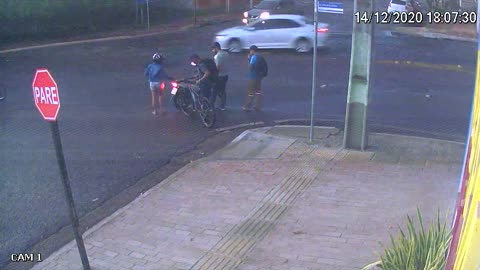 Cyclist Collides with Biker at Busy Intersection