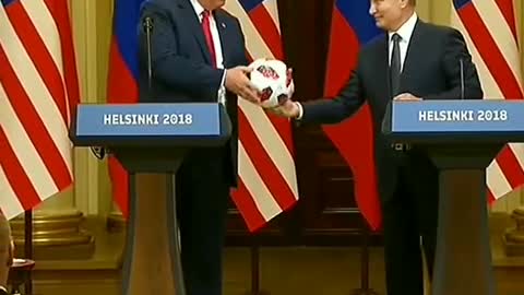 Trump interacts with Putin