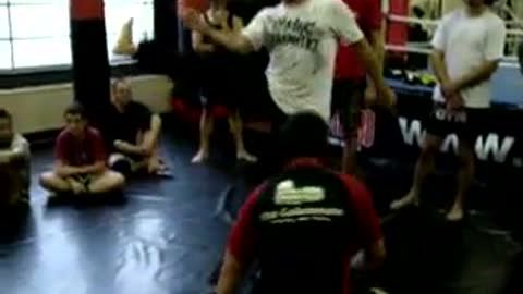 Bas Rutten, defending an Armbar transition to kneebar