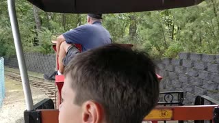 Spencer riding a train at Boomers VID 20190901 123459