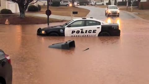 Cop car sinks