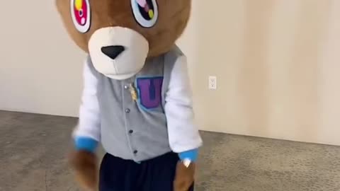 North West rocking Kanye West College Dropout bear mascot suit