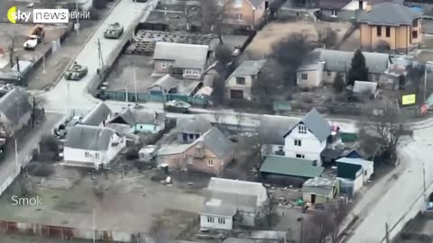 Ukraine War- Cyclist appears to be shot by Russian armoured vehicles in Bucha