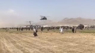 Gut-Wrenching Footage: Afghans Swarm Runway as Helicopters Pull Out