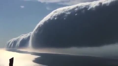 A stunning roll cloud moving over Lake Michigan