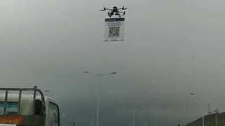 Chinese highway flying robot forces drivers to scan QR code Covid pass