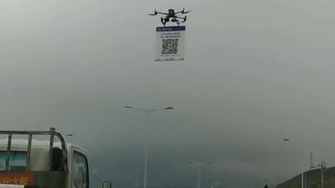 Chinese highway flying robot forces drivers to scan QR code Covid pass